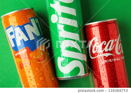 Mykolaiv, Ukraine - March 25, 2026 - Can of Coca-cola , Fanta and Sprite carbonated soft drink logo on green background Mykolaiv, Ukraine - March 25, 2026 - Can of Coca-cola , Fanta and Sprite carbonated soft drink logo on green background 138368753