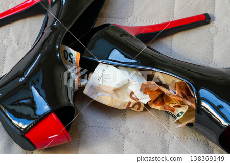 Black red high heels with euro banknotes luxury fashion concept money and glamour style image 138369149