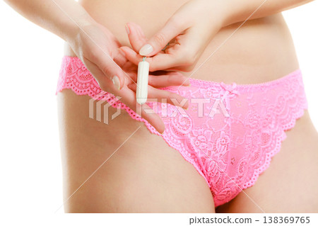 Mentruation time. Girl with hygienic tampon. Mentruation time. Girl with hygienic tampon. 138369765