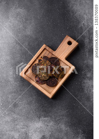 Organic Chinese green pu-erh tea with various herbs in round bricks. Chinese pu-erh tea Organic Chinese green pu-erh tea with various herbs in round bricks. Chinese pu-erh tea 138370089