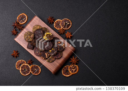Organic Chinese green pu-erh tea with various herbs in round bricks. Chinese pu-erh tea Organic Chinese green pu-erh tea with various herbs in round bricks. Chinese pu-erh tea 138370109