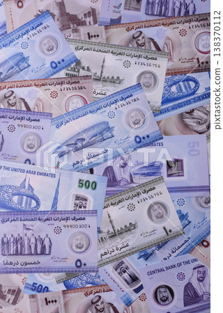 United Arab Emirates cash, dirhams and coins for exchange and financial transactions. UAE currency United Arab Emirates cash, dirhams and coins for exchange and financial transactions. UAE currency 138370112