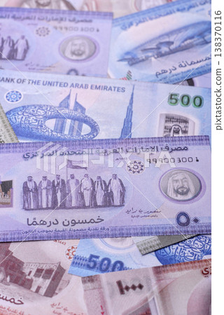 United Arab Emirates cash, dirhams and coins for exchange and financial transactions. UAE currency United Arab Emirates cash, dirhams and coins for exchange and financial transactions. UAE currency 138370116