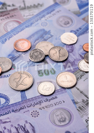 United Arab Emirates cash, dirhams and coins for exchange and financial transactions. UAE currency United Arab Emirates cash, dirhams and coins for exchange and financial transactions. UAE currency 138370119