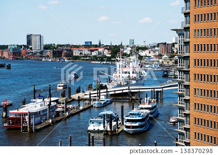 Ships At River Pier On The Elbe River In The Heart Of Hamburg Ships At River Pier On The Elbe River In The Heart Of Hamburg 138370298