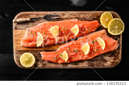 trout fillet red fish with lemon ready for cooking trout fillet red fish with lemon ready for cooking 138370313
