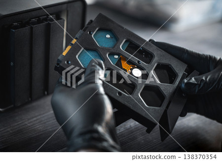 It Specialist Hands Inserting Hdd Drive Into Desktop Das External Storage Unit It Specialist Hands Inserting Hdd Drive Into Desktop Das External Storage Unit 138370354