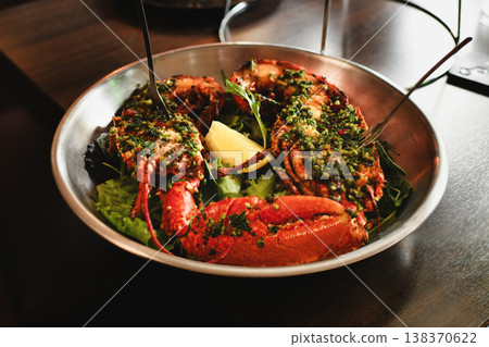 Gourmet lobster with herbs and lemon served in elegant plate Gourmet lobster with herbs and lemon served in elegant plate 138370622
