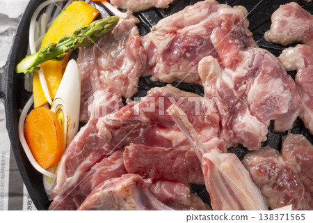 Grilled lamb. Lamb cooking process. 138371565