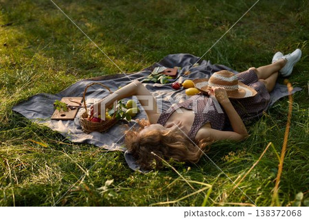 Quiet rural landscape showing woman enjoying her leisure time Quiet rural landscape showing woman enjoying her leisure time 138372068