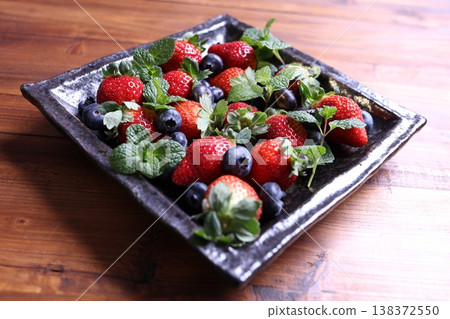 A platter of fresh strawberries and blueberries (berry mix) A platter of fresh strawberries and blueberries (berry mix) 138372550