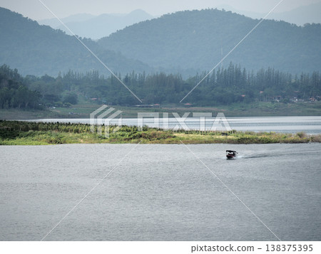 Lake mountain boat nature landscape forest tranquil lake mountain boat nature landscape forest calm water travel scene Lake mountain boat nature landscape forest tranquil lake mountain boat nature landscape forest calm water travel scene 138375395
