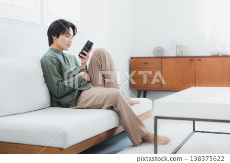 A man with a smartphone A man with a smartphone 138375622