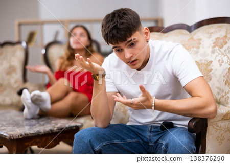 Portrait of a young couple offended by each other after a quarrel Portrait of a young couple offended by each other after a quarrel 138376290