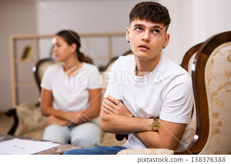 Portrait of a young couple offended by each other after a quarrel Portrait of a young couple offended by each other after a quarrel 138376388