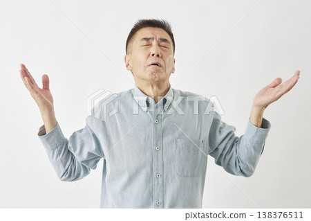 Man giving up on white background Man giving up on white background 138376511