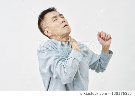 A man with stiff shoulders on a white background A man with stiff shoulders on a white background 138376533
