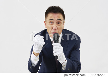 A candidate giving a passionate speech against a white background A candidate giving a passionate speech against a white background 138376556