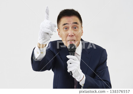 A candidate giving a passionate speech against a white background A candidate giving a passionate speech against a white background 138376557