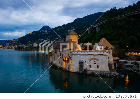 Chillon Castle on Lake Geneva at summer dusk, Switzerland Chillon Castle on Lake Geneva at summer dusk, Switzerland 138376651