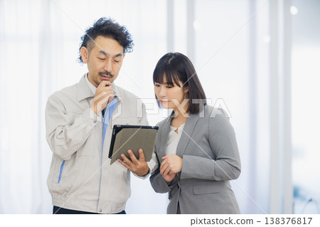 Business woman and worker Business woman and worker 138376817