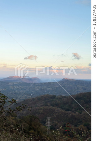 Mountains and valleys during sunset in a rural area 138377435