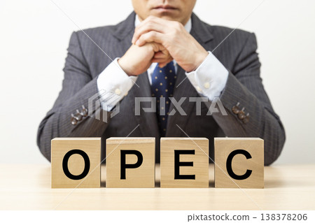 Blocks with "OPEC" written on them and businessmen Blocks with "OPEC" written on them and businessmen 138378206