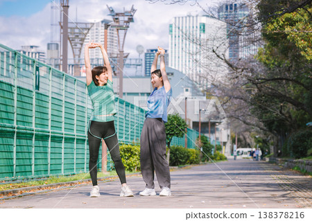 Woman warming up: stretching and warm-up exercises 138378216