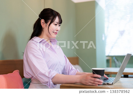 Woman working in coworking space 138378562