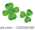 Watercolor-style illustrations of four-leaf and three-leaf clovers 138380390