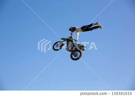 Extreme freestyle motocross jump high in the sky Extreme freestyle motocross jump high in the sky 138381033