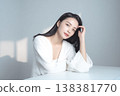 Table and a translucent female beauty portrait; product placement image for product shots. 138381770