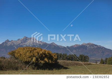 Moon watching the High Tatras panorama Moon watching the High Tatras panorama 138382852