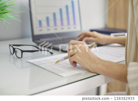 Close-Up Of Woman Working With Laptop In Office Close-Up Of Woman Working With Laptop In Office 138382935