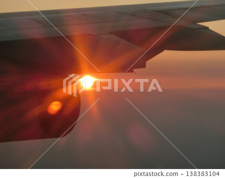 sun seen from an airplane 138383104
