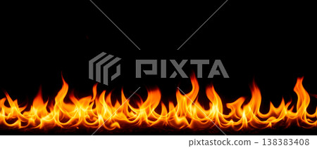 Bright yellow orange fire flames burning against dark black background representing dangerous hot heat energy inferno abstract conceptual design texture 138383408