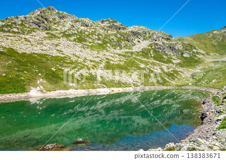 Alpine Jovet lakes with clear reflection in Les Contamines-Montjoie, France 138383671