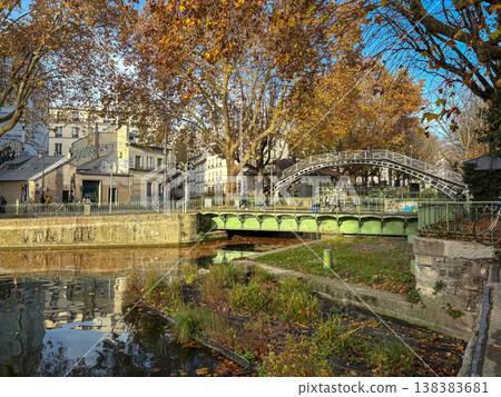 Autumn bridge view over canal Saint Martin in Paris, France Autumn bridge view over canal Saint Martin in Paris, France 138383681