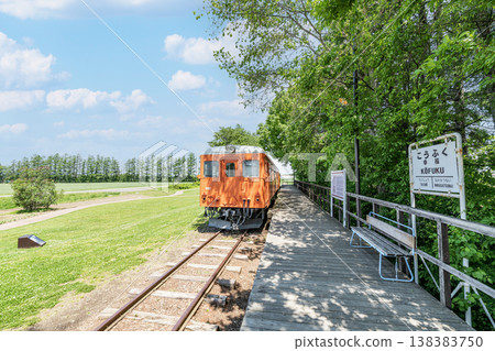 Kiha 22 series locomotive No. 221 and platform, preserved at Kofuku Station on the former JNR Hiroo Line in Obihiro City, Hokkaido. 138383750