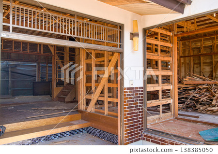 Demolition site of an old wooden house Demolition site of an old wooden house 138385050