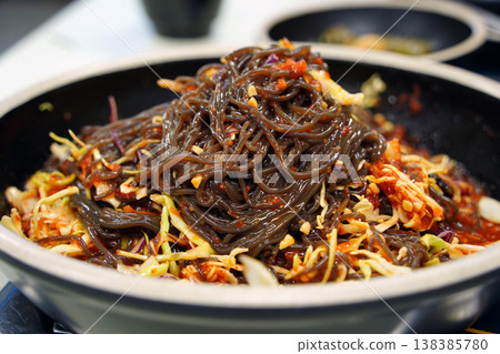 Korean Spicy Buckwheat Noodles (Mak-guksu) with Fresh Vegetables in a Bowl 138385780