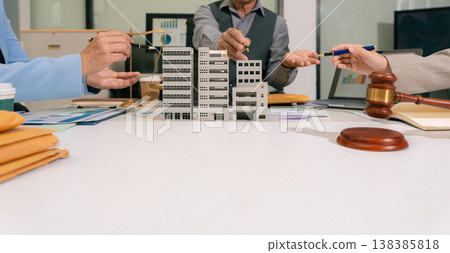 Justice and law concept. Real Estate Law in a courtroom the gavel, working with digital tablet computer. Justice and law concept. Real Estate Law in a courtroom the gavel, working with digital tablet computer. 138385818
