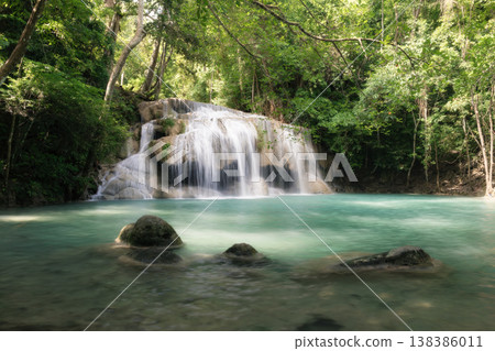 Ethereal Cascade in the Emerald Embrace Ethereal Cascade in the Emerald Embrace 138386011