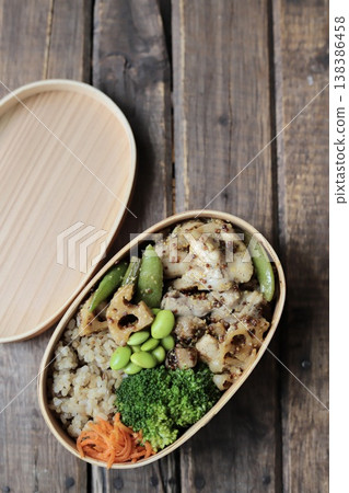 A healthy bento box with mustard chicken and plenty of vegetables, under 500 calories. A healthy bento box with mustard chicken and plenty of vegetables, under 500 calories. 138386458