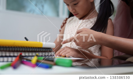 Back to School: Parent Guiding Child in Homework 138386530