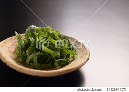 Shredded perilla leaves (shiso) can be used as a garnish or coloring for dishes. Shredded perilla leaves (shiso) can be used as a garnish or coloring for dishes. 138386875