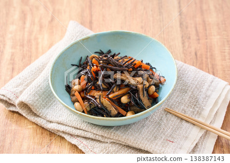 Simmered hijiki seaweed with carrots, soybeans, and fried tofu - a Japanese side dish. 138387143