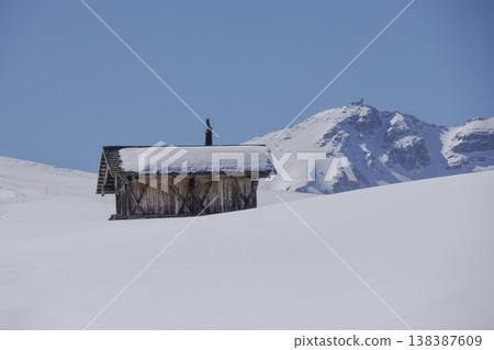 wooden hut covered by snow in armentarola pralongi? dolomites mountains 138387609