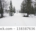 Trekking in the dolomites mountains under a heavy snow in winter 138387636