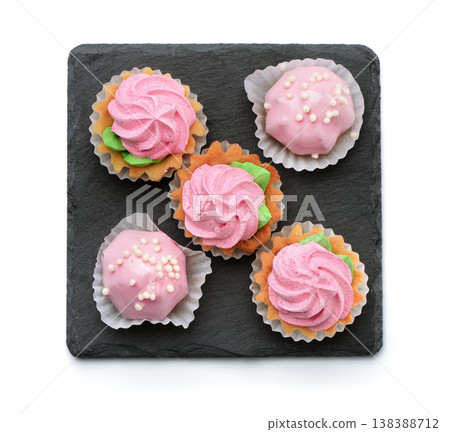 Top view of mini cakes on slate plate Top view of mini cakes on slate plate 138388712